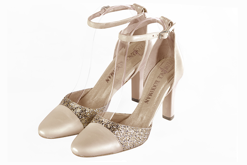 Gold women's open side shoes, with a strap around the ankle. Round toe. Very high kitten heels. Front view - Florence KOOIJMAN